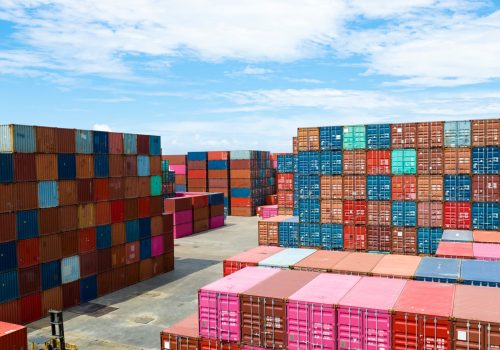 Container logistic. Cargo and shipping business. Container ship for import and export logistic. Container freight station. Logistic industry from port to port. Container at harbor for truck transport.